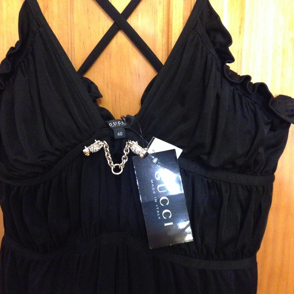 This a 100% Authentic Gucci Gown. Brand NEW with tags. Never worn! No odors